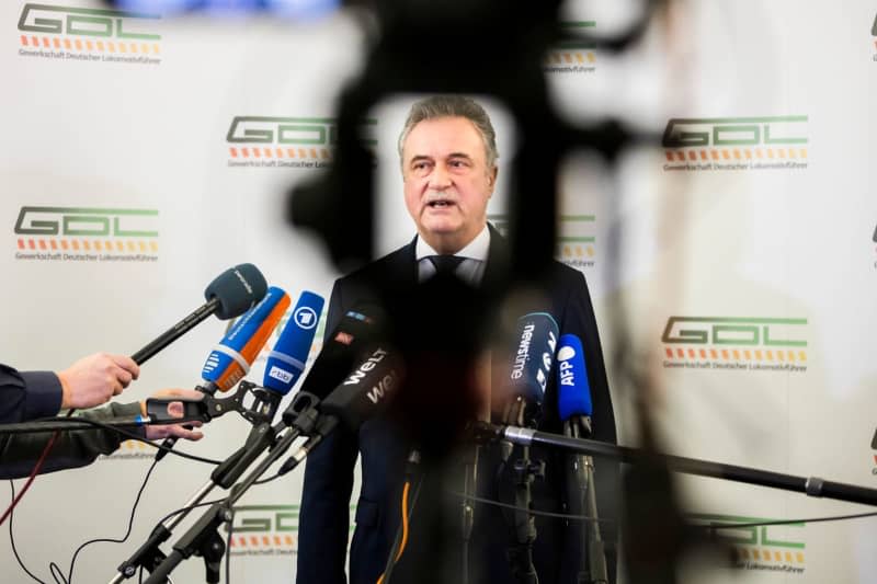 Claus Weselsky, Chairman of the German Train Drivers' Union (GDL), speaks at a press conference of the train drivers' union GDL on the upcoming six-day strike at Deutsche Bahn. The strike is scheduled to begin on 24 January for passenger services. Christoph Soeder/dpa