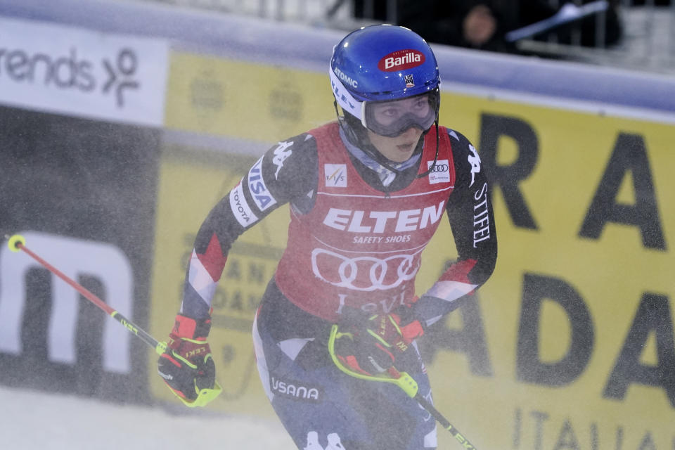 United States' Mikaela Shiffrin checks her time at the finish area of an alpine ski World Cup women's slalom race, in Levi, Finland, Saturday, Nov. 11, 2023. (AP Photo/Giovanni Auletta)