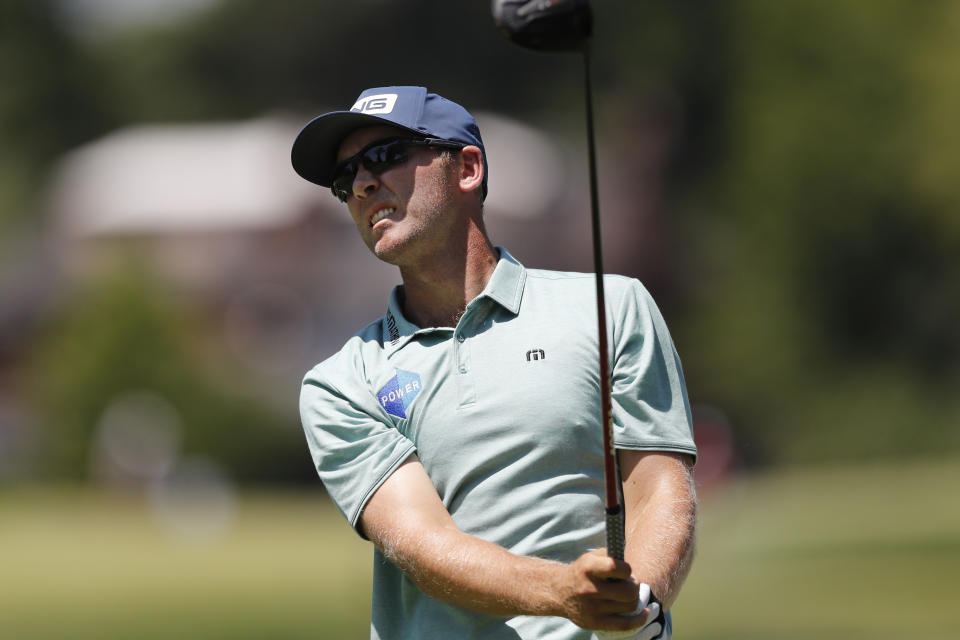 Seamus Power drives on the second tee during the final round of the Rocket Mortgage Classic golf tournament, Sunday, July 5, 2020, at Detroit Golf Club in Detroit. (AP Photo/Carlos Osorio)