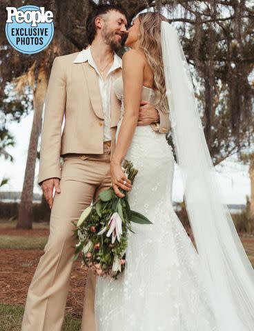 <p>Sydney Breland Photography</p> Halle Kearns with her new husband, Kelly Roberson