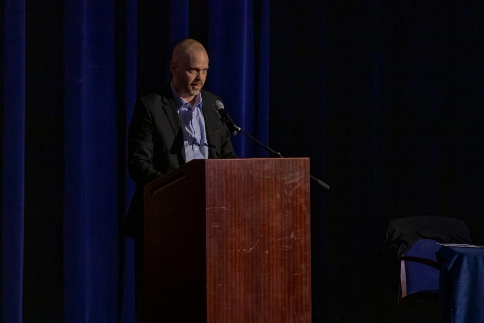 Steering Committee chair Joe Farrell speaks during the donation distribution plan town hall at the Oxford High School Auditorium in Oxford on Monday March 21, 2022. The fund will be distributed to those affected by the Nov. 30, 2021 shooting.