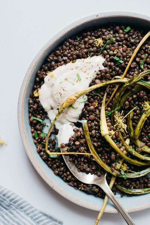 <strong>Get the <a href="http://www.dollyandoatmeal.com/blog/2015/6/herbed-beluga-lentils-w-garlic-scapes-yogurt-sauce" target="_blank">Herbed Black Beluga Lentils with Garlic Scapes and Yogurt Sauce recipe</a>&nbsp;from&nbsp;Dolly and Oatmeal</strong>