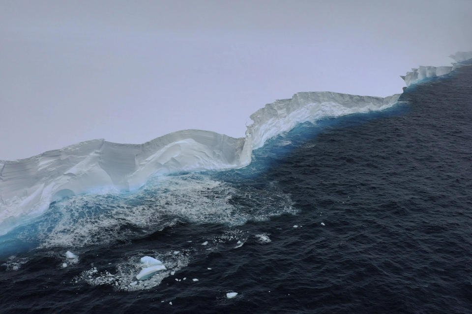 In this handout photo provided by the British Antarctic Survey, a view of the A23a iceberg is seen from the RRS Sir David Attenborough, Antarctica, Friday, Dec. 1, 2023. Britain's polar research ship has crossed paths with the largest iceberg in the world in a “lucky” encounter that enabled scientists to collect seawater samples around the colossal berg as it drifts out of Antarctic waters. The British Antarctic Survey said Monday, Dec. 4 that the RRS Sir David Attenborough passed the mega iceberg, known as the A23a, on Friday near the tip of the Antarctic Peninsula. (T. Gossman, M. Gascoyne, C. Grey/British Antarctic Survey via AP)