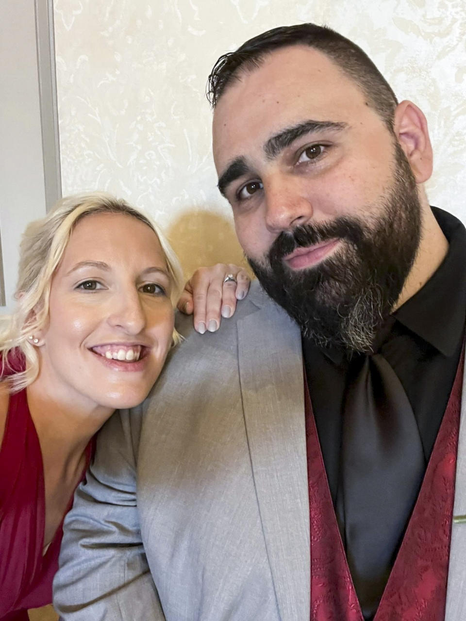 Greg Mason shares a happy moment with his wife, Andrea. He said he had perfect vision before he started to notice floaters in his eyes six years ago. (Courtesy Greg Mason)