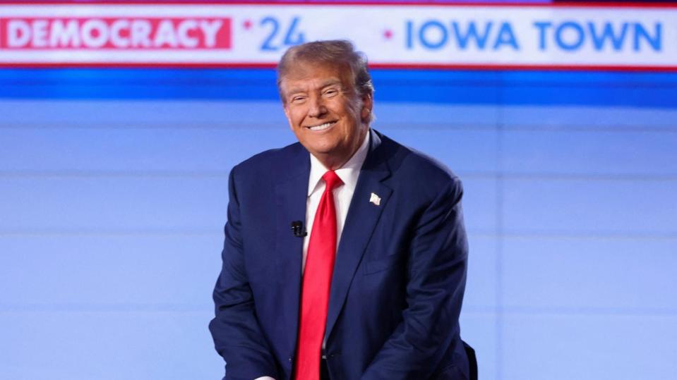 PHOTO: Republican presidential candidate and former President Donald Trump reacts during a Fox News Channel town hall ahead of the caucus vote in Des Moines, Iowa, Jan. 10, 2024.  (Scott Morgan/Reuters)