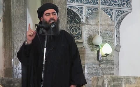 Baghdadi announces himself as caliph in 2014 - Credit: AP Photo/Militant video