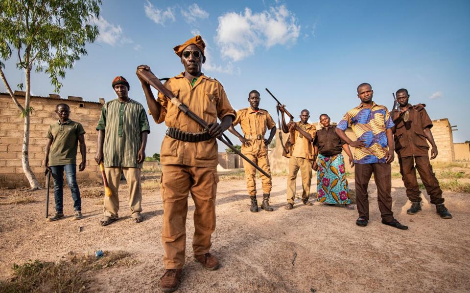 Self defence force the Koglweogo in the village of Poessin near Ouagadougou.  - Simon Townsley/The Telegraph