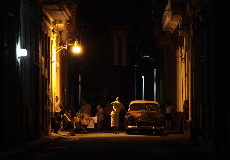 Neighbours gather on street to celebrate 53rd anniversary of creation of Committees for Defense of Revolution in Havana