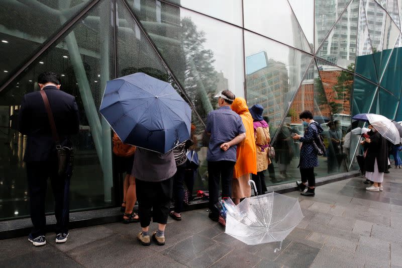 Supporters of late Seoul Mayor Park Won-soon gather outside Seoul City Hall Plaza, where his funeral is being held, in Seoul