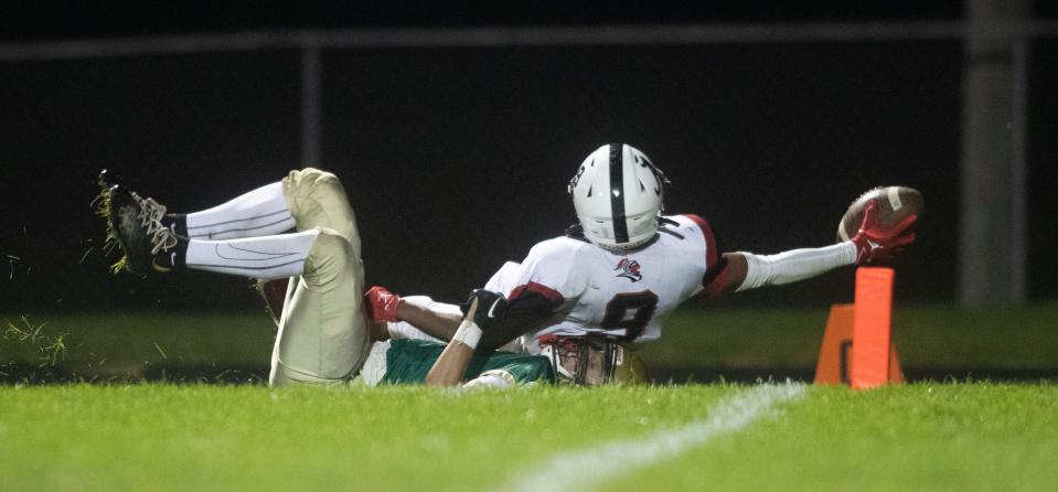 Auburn's Leonard Spates catches a pass to the 1-yard line against Boylan on Friday, Sept. 22, 2023, at Boylan High School in Rockford.