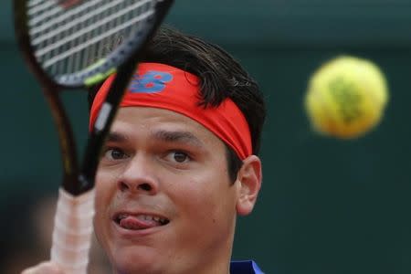 Tennis - French Open - Roland Garros - Milos Raonic of Canada v Albert Ramos-Vinola of Spain - Paris, France - 29/05/16. Milos Raonic returns the ball. REUTERS/Pascal Rossignol