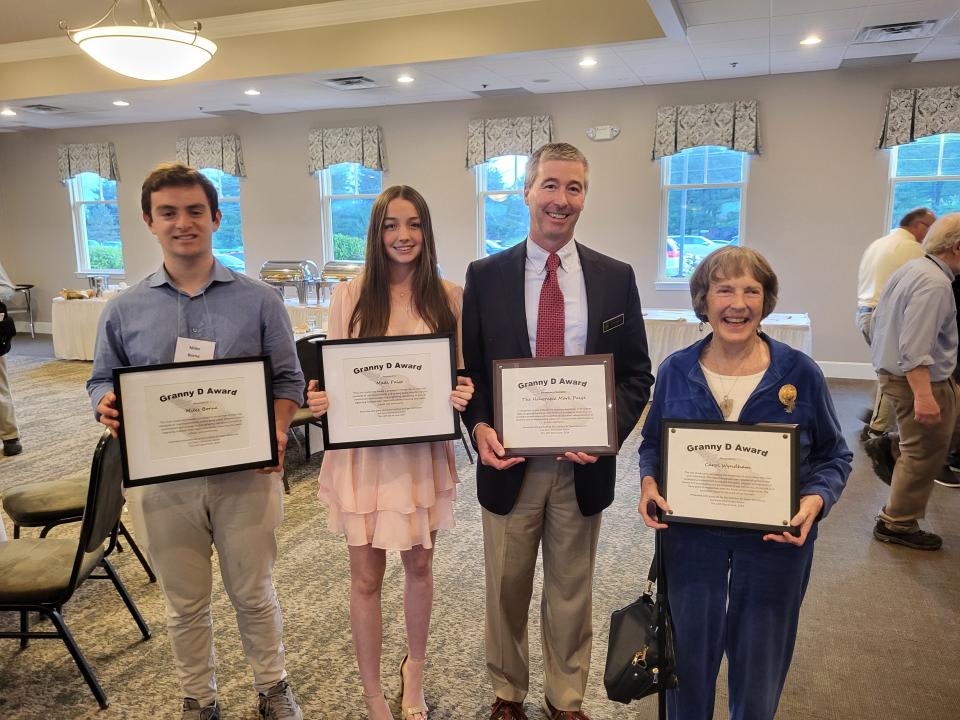 Exeter High School senior Madi Paige and Portsmouth High School junior Miles Borne received Civic Leadership Awards at the Coalition for Open Democracy annual meeting.