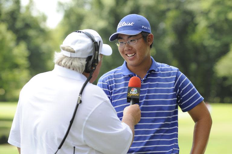 Byeong-hun An is interviewed following a match win at the semi-finals of the US Amateur Golf Championship at Southern Hills Country Club in Tulsa, Oklahoma, in 2009