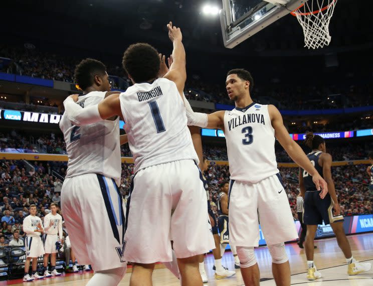 Villanova Wildcats forward Kris Jenkins (2), Villanova Wildcats guard Jalen Brunson (1) and Villanova Wildcats guard Josh Hart (3) huddle up during the NCAA Division I Men's Basketball Championship first round game between Mount St. Mary's Mountaineers and Villanova Wildcats on March 16, 2017. (Getty)