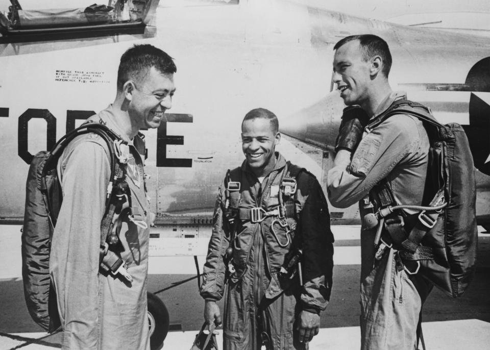 Captain Edward J Dwight (centre), the first African-American to have entered the Air Force training program from which NASA selected astronauts, pictured with fellow pilots at Edwards Air Force Base in California, circa April 1963.