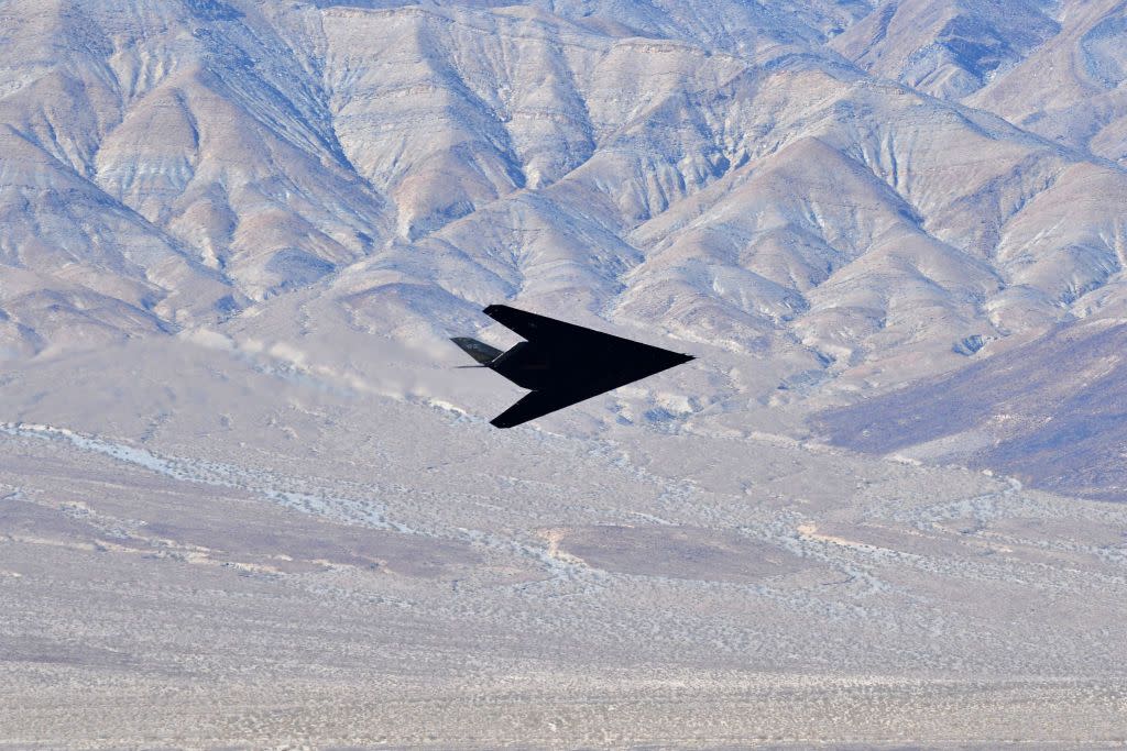 f 117 nighthawk stealth fighter flies in death valley, california