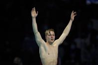 Zach Harting reacts after winning the men's 200 butterfly during wave 2 of the U.S. Olympic Swim Trials on Wednesday, June 16, 2021, in Omaha, Neb. (AP Photo/Charlie Neibergall)