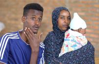 Asylum-seekers who arrived from Libya, play at the United Nations emergency transit centre in Gashora