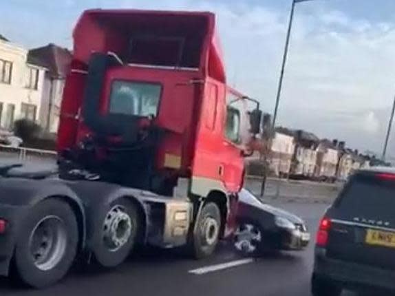 Witnesses said the car had been pushed along by the lorry for around a mile before it was flagged down: Twitter/@ShaanAssi99