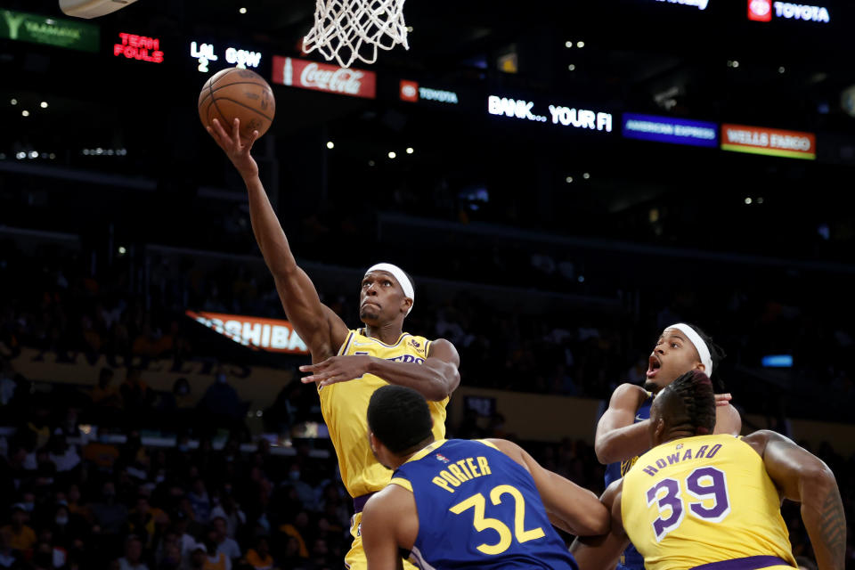 FILE - Los Angeles Lakers guard Rajon Rondo goes to the basket against the Golden State Warriors during the first half of an NBA basketball game in Los Angeles, Tuesday, Oct. 19, 2021. Cleveland completed its acquisition of the 35-year-old Rondo on Monday, Jan. 3, 2021, finalizing their trade with the Los Angeles Lakers and what became a three-team deal also involving the New York Knicks.(AP Photo/Ringo H.W. Chiu, File)