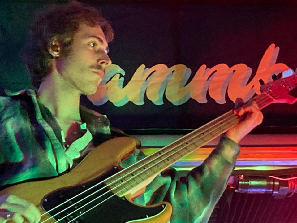 Nathaniel van Osdol, bass player for Brattleboro band Thus Love, performs Aug. 27, 2022 at the Nightshade Festival at Red Barn Gardens in Williston.