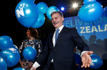 New Zealand Prime Minister Bill English arrives on stage with his wife Mary during an election night event in Auckland, New Zealand, September 23, 2017. REUTERS/Nigel Marple