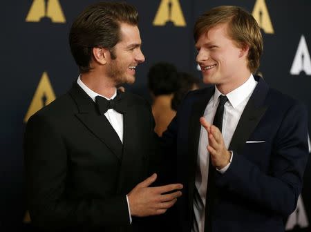 Actors Andrew Garfield (L) and Lucas Hedges arrive at the 8th Annual Governors Awards in Los Angeles, California, U.S., November 12, 2016. REUTERS/Mario Anzuoni