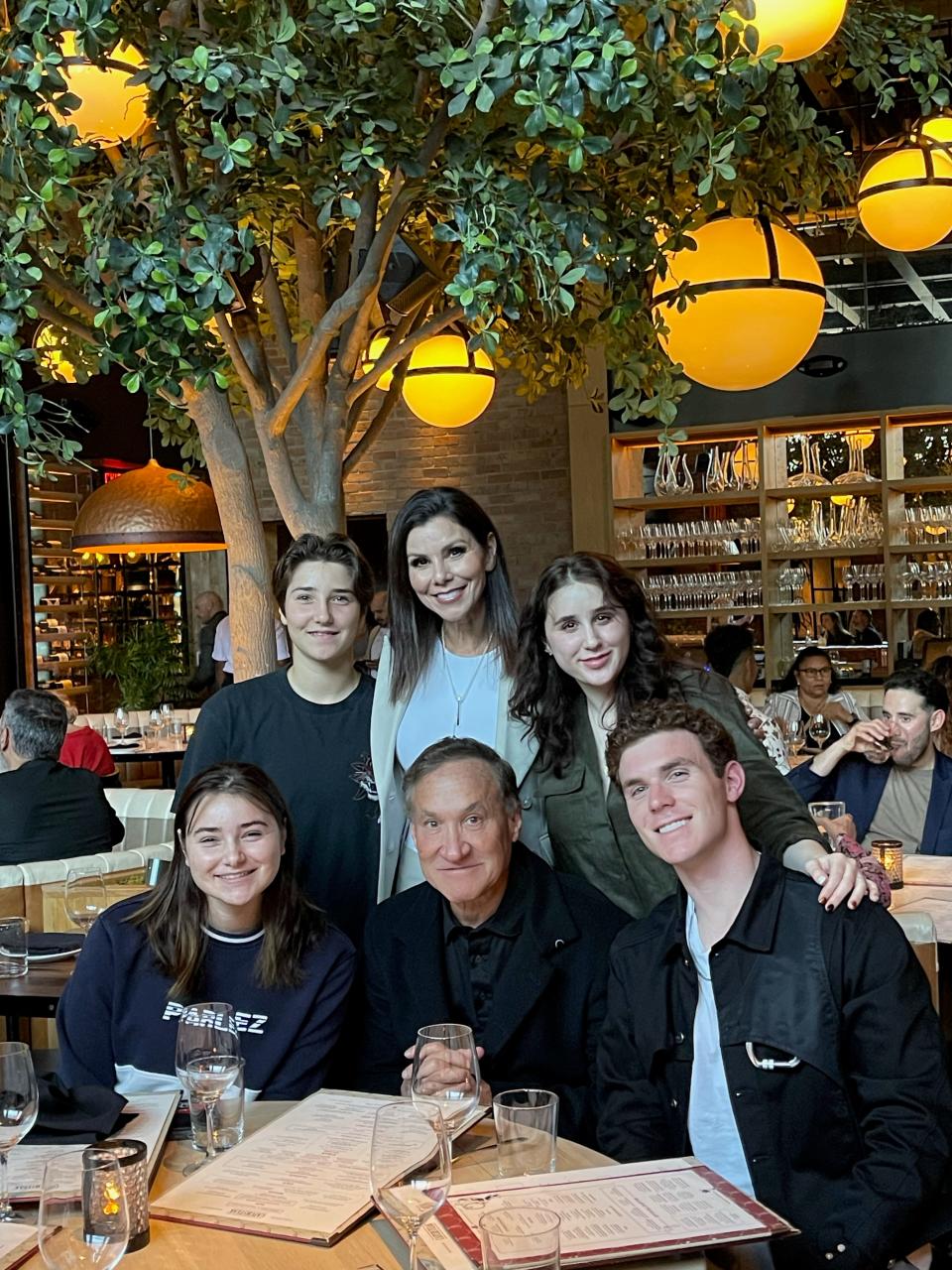 Heather Dubrow (center top row) and her family: Ace (top left) Max (top right); bottom row: Kat, Terry and Nick.