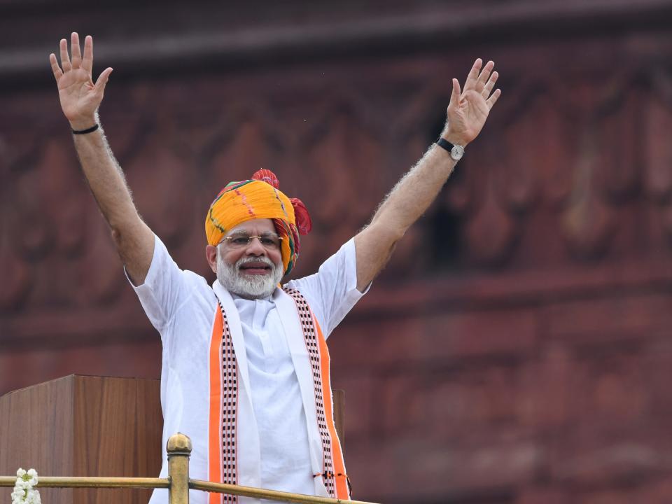 India's Prime Minister Narendra Modi waves at the crowd during a ceremony to celebrate country's 73rd Independence Day, which marks the of the end of British colonial rule, at the Red Fort in New Delhi on August 15, 2019.