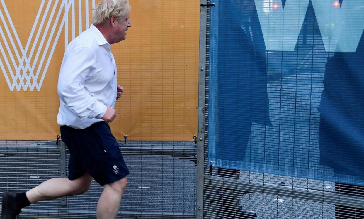 <span>Totally unexpected … former prime minister Boris Johnson jogging in a shirt and brogues.</span><span>Photograph: Toby Melville/Reuters</span>