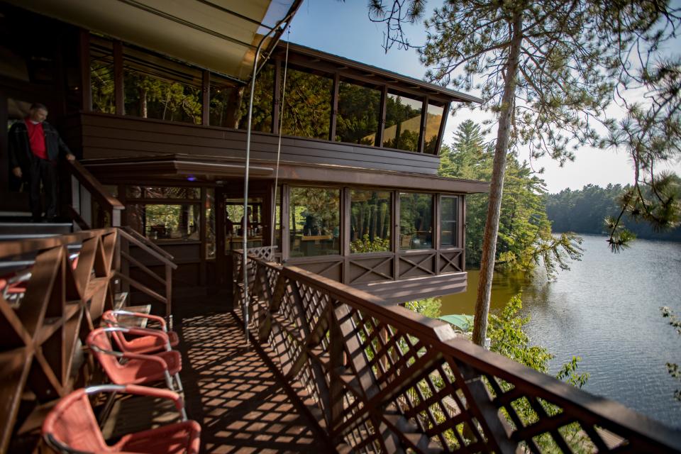 A deck provides a spot for sipping an old fashioned while enjoying views of Mirror Lake at Ishnala Supper Club in Lake Delton.