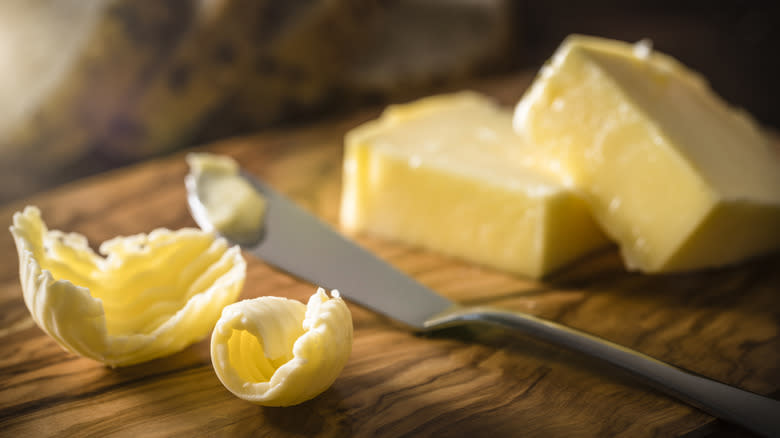 Curled butter on cutting board