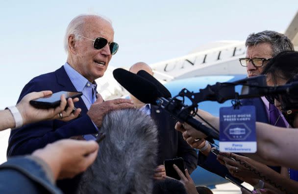 PHOTO: President Joe Biden talks to reporters while boarding Air Force One from Delaware Air National Guard Base in New Castle, Del., Aug. 8, 2022. (Kevin Lamarque/Reuters)