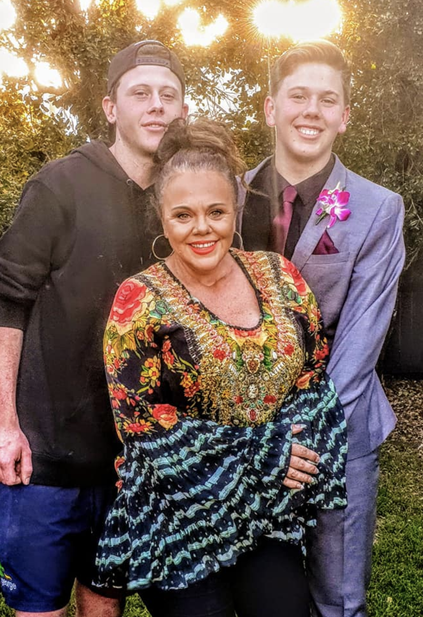 Lisa Wallis is seen standing with her two sons, Lachy (left) and Mitchell (right). Source: Supplied