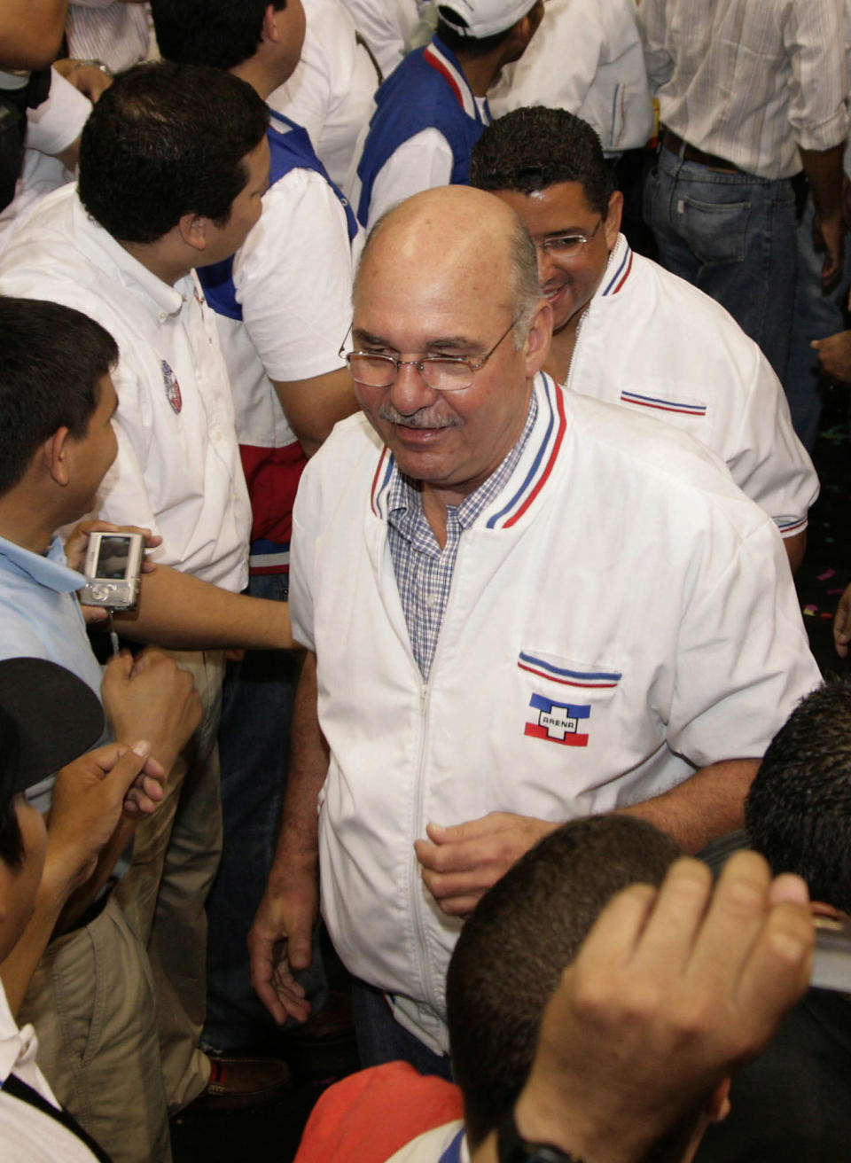 FILE - In this Oct. 10, 2008 file photo, Alfredo Cristiani, former president of El Salvador, attends the general assembly of his political party in San Salvador. The Spanish court that sentenced on Sept. 11, 2020, former Salvadoran colonel Inocente Orlando Montano for the 1989 massacre of five Spanish Jesuit priests, called it “state terrorism” carried out by powerful interests, including Cristiani, aimed at “holding onto their positions of privilege within the power structures.” Cristiani has denied any involvement or knowledge of the plan to kill the priests. (AP Photo/Edgar Romero, File)