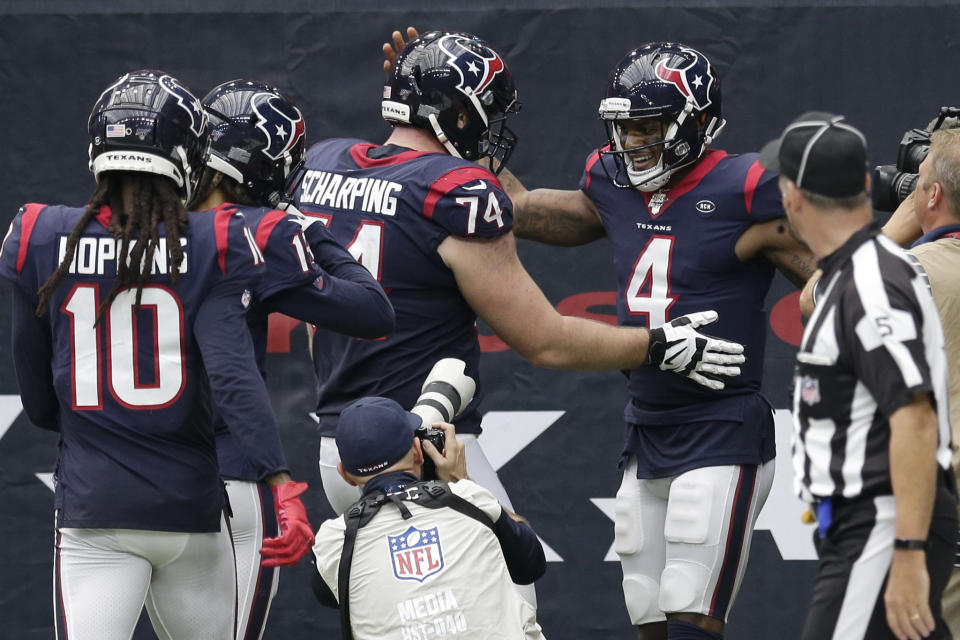 Houston Texans quarterback Deshaun Watson (4) celebrates his touchdown run against the Carolina Panthers during the second half of an NFL football game Sunday, Sept. 29, 2019, in Houston. (AP Photo/Michael Wyke)