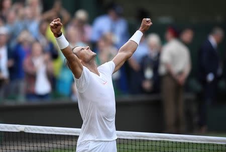 Tennis - Wimbledon - All England Lawn Tennis and Croquet Club, London, Britain - July 11, 2018 Spain's Rafael Nadal celebrates winning his quarter final match against Argentina's Juan Martin Del Potro REUTERS/Tony O'Brien