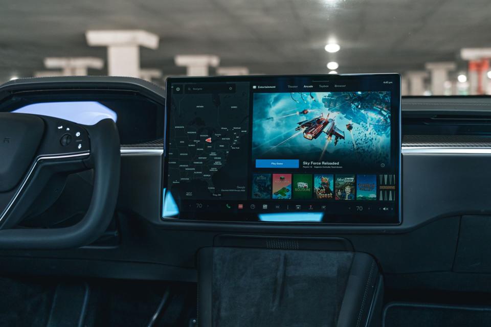 <p>The center screen itself is all new and no longer comes in portrait orientation. Instead, the 17.0-inch touchscreen is in landscape orientation, similar to the <a href="https://www.caranddriver.com/tesla/model-3" rel="nofollow noopener" target="_blank" data-ylk="slk:Model 3;elm:context_link;itc:0;sec:content-canvas" class="link ">Model 3</a> and <a href="https://www.caranddriver.com/tesla/model-y" rel="nofollow noopener" target="_blank" data-ylk="slk:Y;elm:context_link;itc:0;sec:content-canvas" class="link ">Y</a> but two inches larger. The resolution is incredible, at 2200 by 1300 pixels, and the picture is bright and vivid. "You can tell they didn't skimp on quality there," noted staff editor Drew Dorian. The software has also been overhauled, and Tesla says it has 10 teraflops of processing power, enough to rival the PlayStation 5. </p>