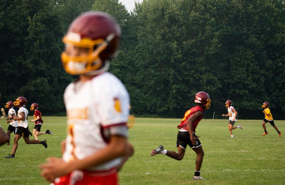 Westerville North runs drills during Monday's workout.