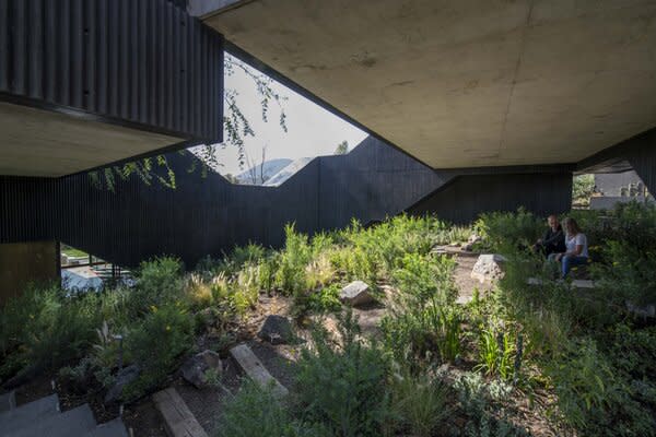 Designed by Michel Rojkind and featured in Dwell’s July/August 2022 issue, Casa Pasiddhi encircles a sun-kissed garden with brutalist volumes.