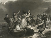 This circa 1869 engraving titled "Landing of the Pilgrims on Plymouth Rock, 1620" made available by the Library of Congress depicts a woman being helped ashore from a small boat held in position against a rock by men with ropes and poles. At background right, other Pilgrims kneel in prayer. (Peter Frederick Rothermel, Joseph Andrews/Library of Congress via AP)