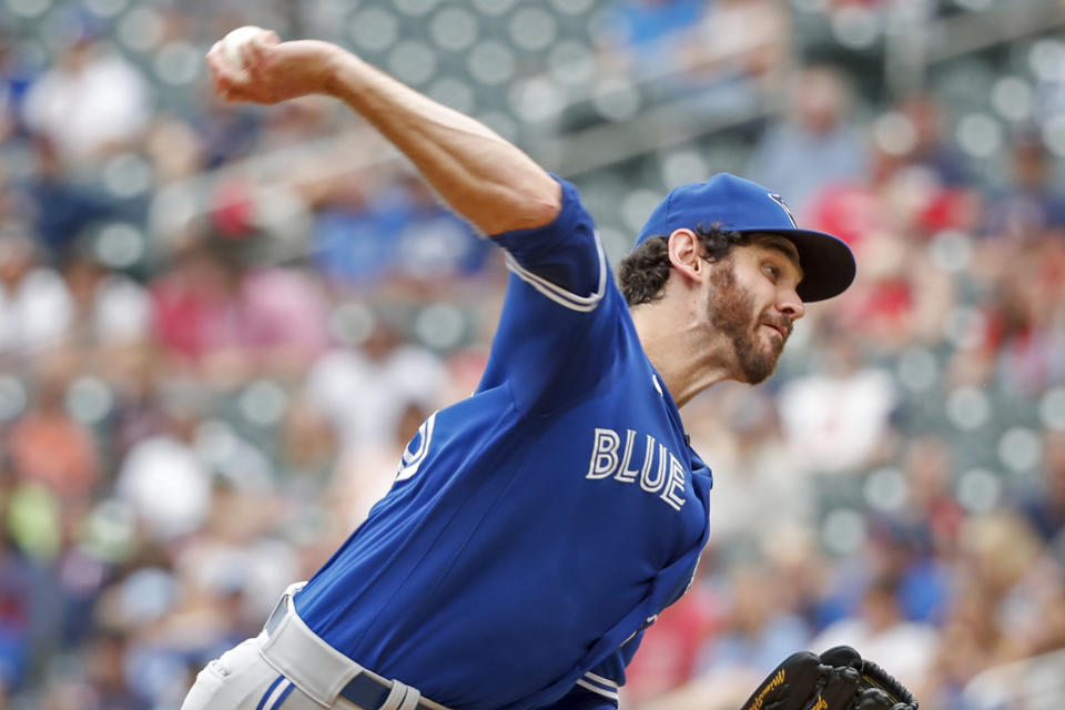 Toronto Blue Jays relief pitcher Jordan Romano throws to the Minnesota Twins in the tenth inning of a baseball game Sunday, Aug. 7, 2022, in Minneapolis. (AP Photo/Bruce Kluckhohn)