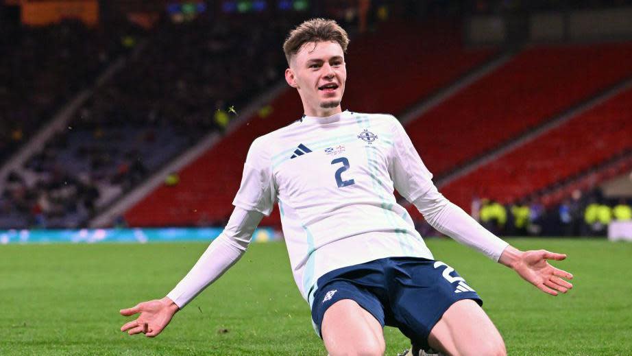 Conor Bradley celebrates his goal against Scotland in March