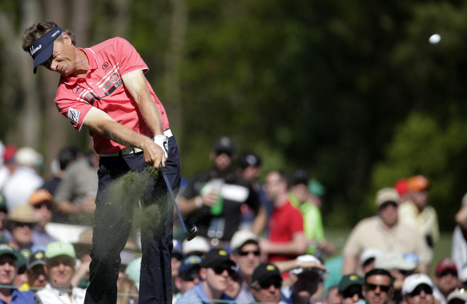 Bernhard Langer, of Germany, tees off on the 12th hole during the first round of the Masters golf tournament Thursday, April 10, 2014, in Augusta, Ga. (AP Photo/Charlie Riedel)