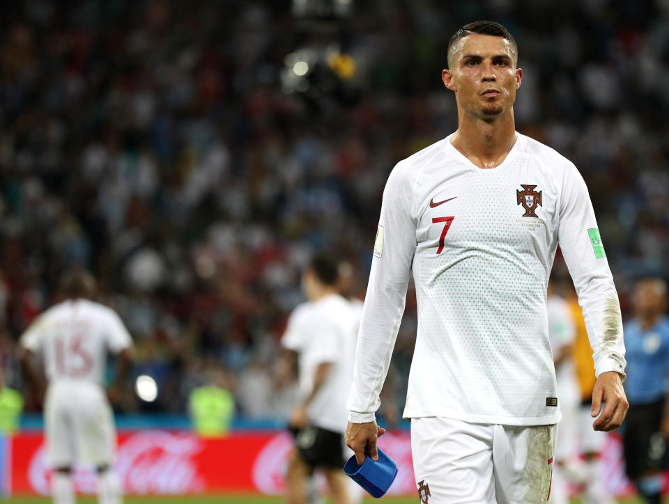 Cristiano Ronaldo will be watching the rest of the World Cup from his couch. (Getty)