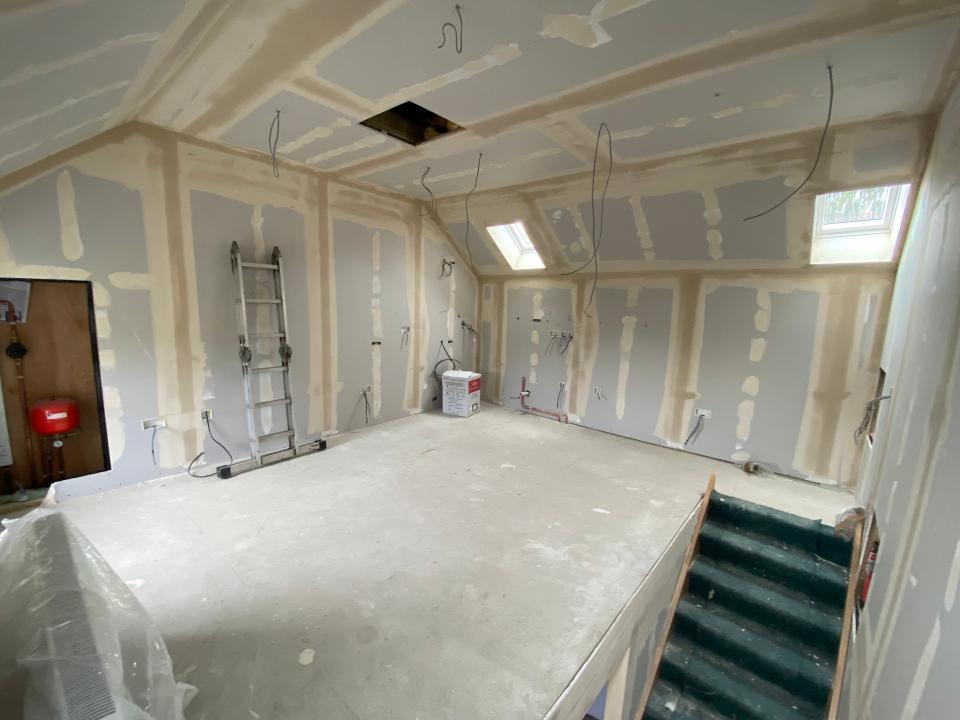 Progress photo of the upper floor.