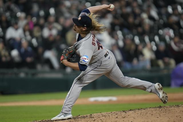 Houston Astros relief pitcher Ryne Stanek throws during the seventh inning of a baseball game against the Chicago White Sox, Saturday, May 13, 2023, in Chicago. (AP Photo/Erin Hooley)