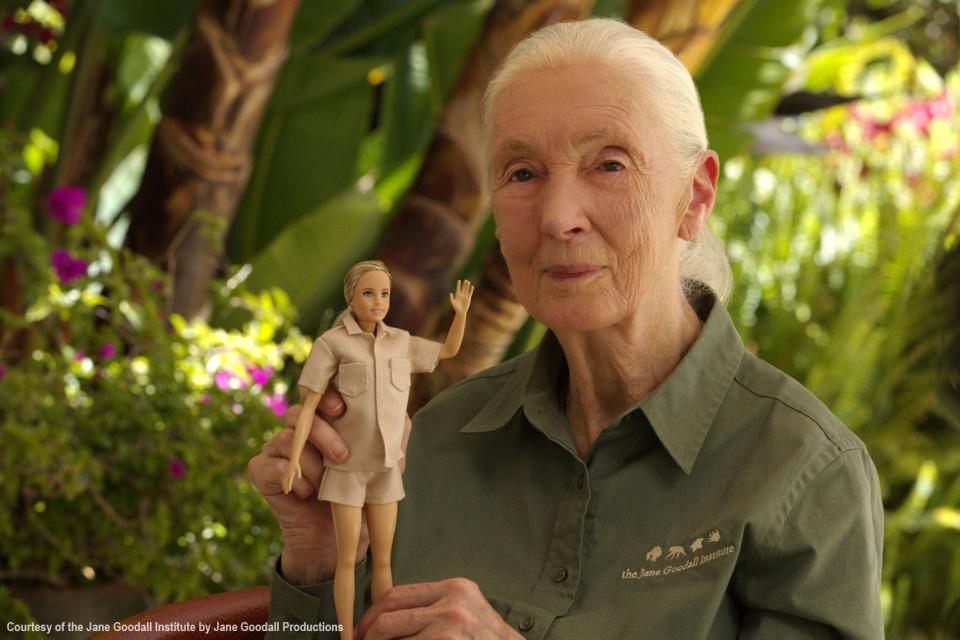Jane Goodall with the 2022 Barbie created in her honor as part of the Inspiring Women series.