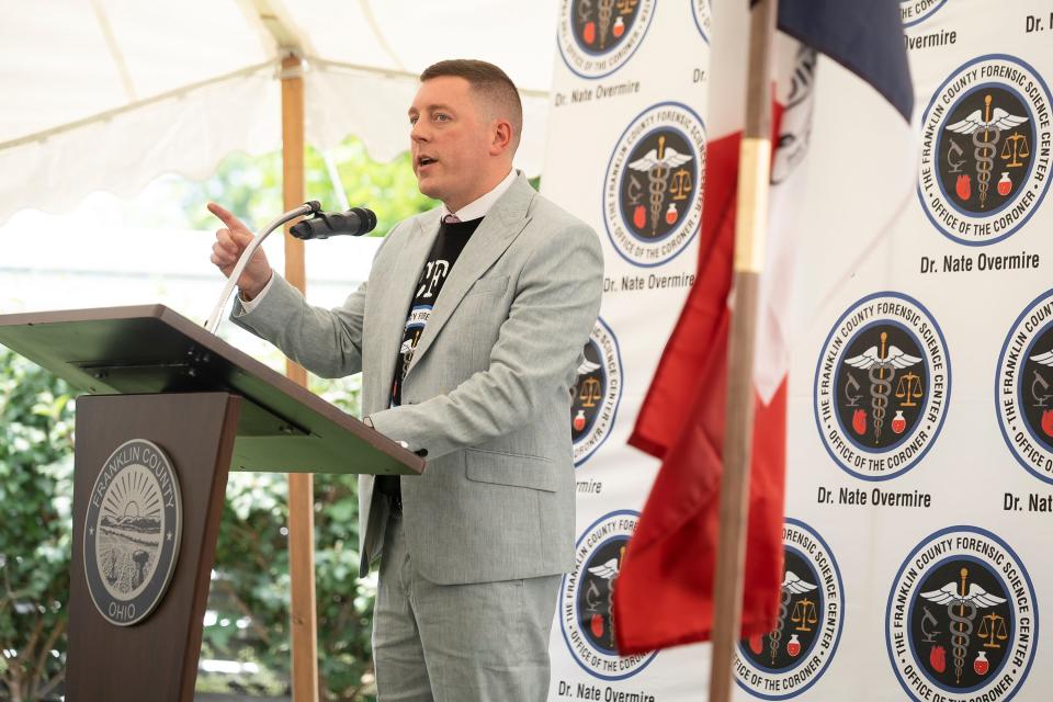 Franklin County Coroner Dr. Nathaniel Overmire speaks July 26, 2023 during a dedication event for the Franklin County Forensic Science Center in Columbus. The facility opened in 2020, but because of the COVID-19 pandemic the building's opening ceremony wasn't previously held.