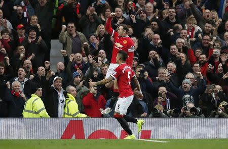 Wayne Rooney celebrates after scoring the first goal for Manchester United from the penalty spot. Reuters / Phil Noble Livepic